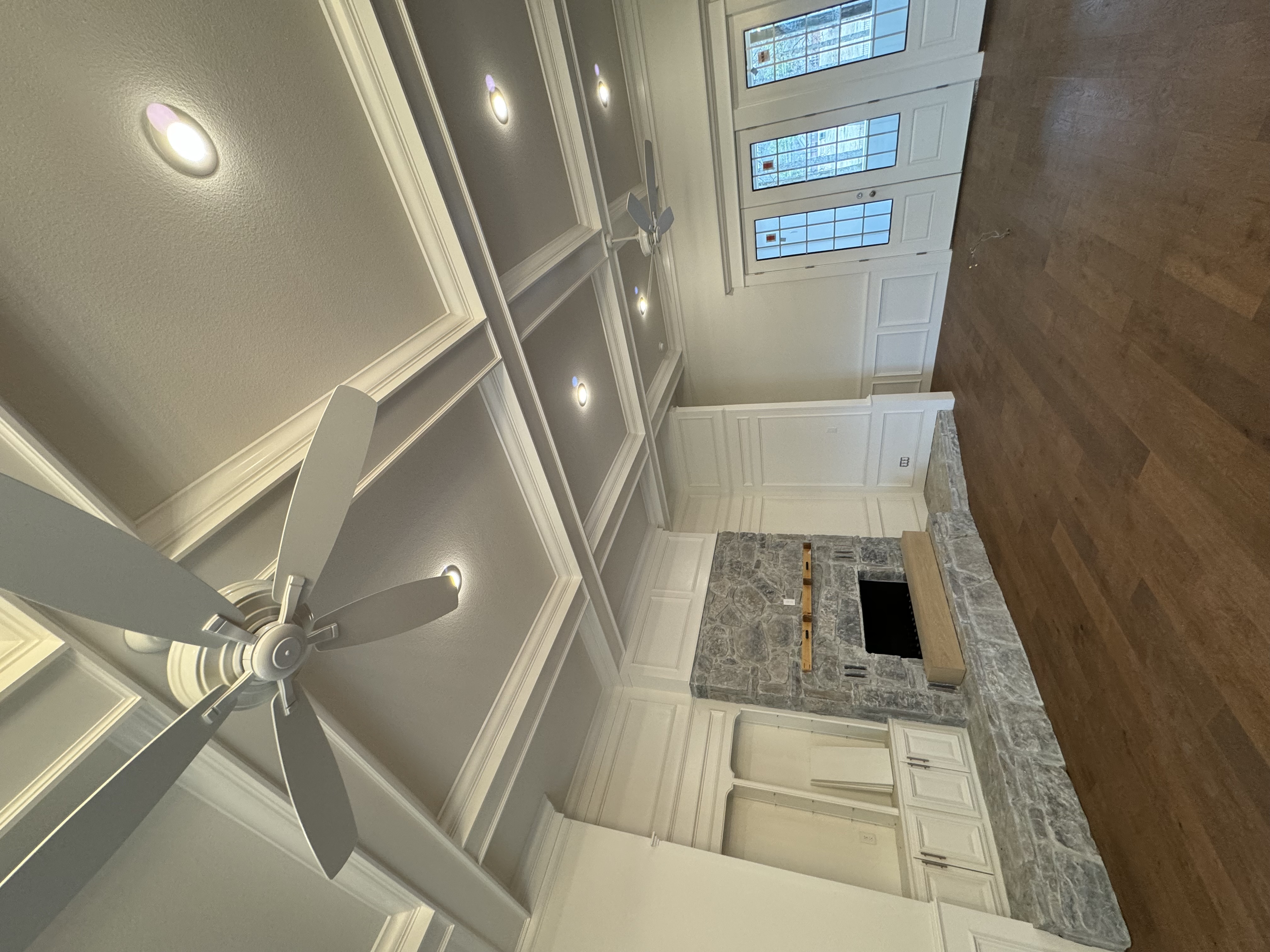 Coffered ceiling with big crown molding and beams